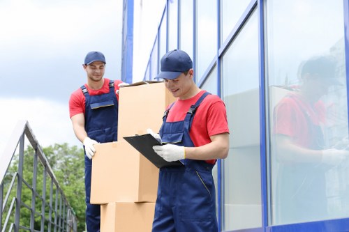 People preparing boxes for a Stockwell removal