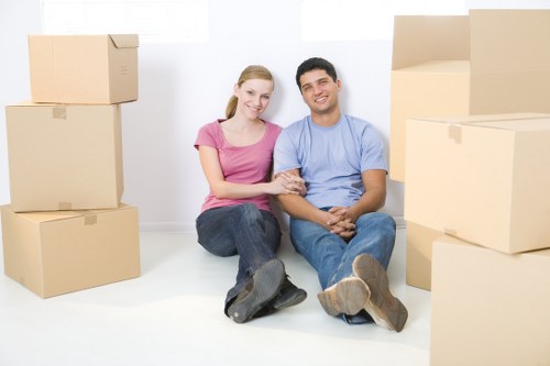 Boxes and furniture being unloaded at a new Stockwell property