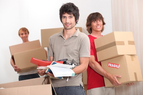 Boxes and household items arranged for removal truck transport