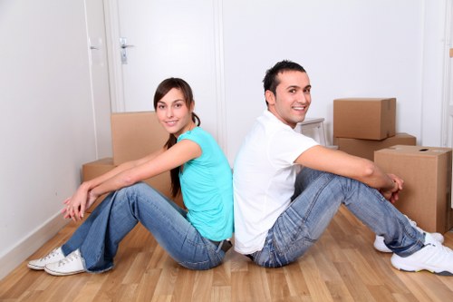 Stockwell commercial removals workers handling packed office boxes