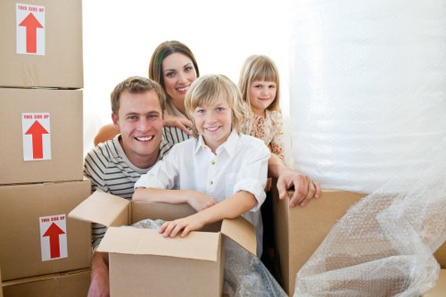 Packed office boxes and furniture ready for relocation