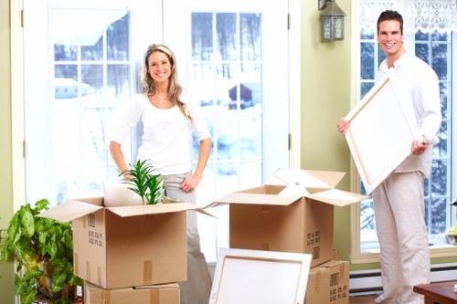 Loading furniture into a removals van in Stockwell