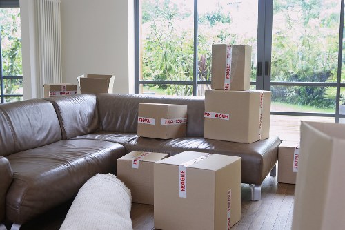 Loading furniture into a van on a Stockwell residential street